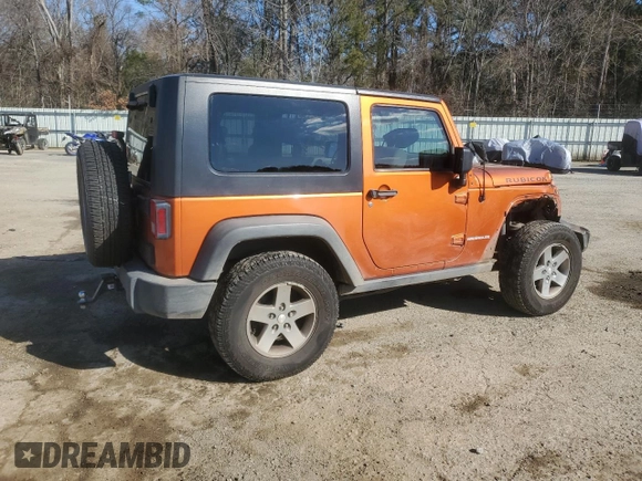 2010 Jeep Wrangler Rubicon with VIN 1J4BA6D17AL208835, listed as a Copart auction lot 41851855 with 107,771 mi miles and Salvage title. Bid and sale history available at DreamBid. Image 3.