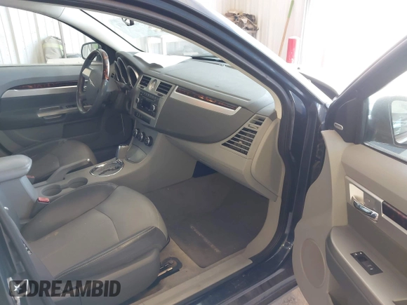 2007 Chrysler Sebring Limited с VIN 1C3LC66K87N549169, выставлен на аукционе IAAI как лот 42811071 с пробегом 232 042 миль миль и . История ставок и продаж доступна на DreamBid. Изображение 5.