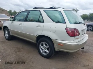 2000 Lexus RX 300 with VIN JT6HF10U1Y0098064, listed as a IAAI auction lot 42046249 with 216,171 mi miles. Bid and sale history available at carsss.com. Image 3.