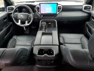 2022 Toyota Tundra Platinum with VIN 5TFNA5DB9NX028910, listed as a Copart auction lot 73638914 with 25,404 mi miles and Salvage title. Bid and sale history available at DreamBid. Image 8.