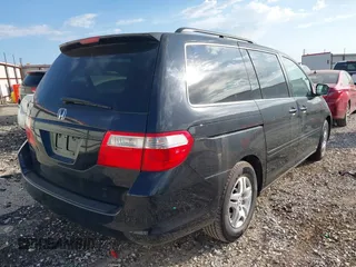 2007 Honda Odyssey EX-L with VIN 5FNRL38767B139398, listed as a IAAI auction lot 42044526 with 191,041 mi miles. Bid and sale history available at carsss.com. Image 4.