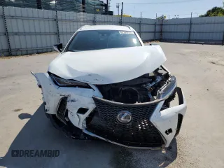 2021 Lexus UX 250h F Sport with VIN JTHE9JBH0M2043962, listed as a Copart auction lot 62220935 with 43,278 mi miles and Salvage title. Bid and sale history available at DreamBid. Image 5.