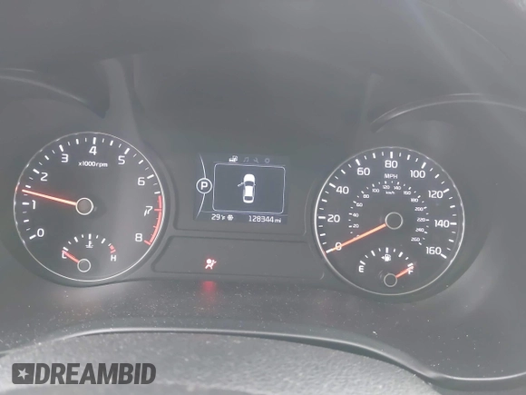 2018 Kia Optima LX with VIN 5XXGT4L3XJG242796, listed as a IAAI auction lot 41181640 with 128,344 mi miles. Bid and sale history available at carsss.com. Image 7.