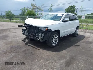2014 Jeep Grand Cherokee Summit with VIN 1C4RJFJT6EC281114, listed as a IAAI auction lot 42497582 with 128,181 mi miles and . Bid and sale history available at DreamBid. Image 17.