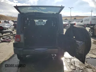 2017 Jeep Wrangler Unlimited Sahara with VIN 1C4HJWEG4HL615069, listed as a Copart auction lot 46480225 with 104,723 mi miles and Salvage title. Bid and sale history available at DreamBid. Image 6.