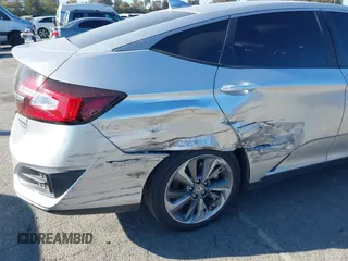 2019 Honda Clarity Touring z VIN JHMZC5F38KC003399, wystawiony jako IAAI lot #41818175 z przebiegiem 54 896 mil mil oraz . Historia ofert i sprzedaży dostępna na DreamBid. Obrazek 6.