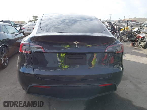 2025 Tesla Model Y Long Range with VIN 7SAYGDED6SF229498, listed as a IAAI auction lot 41086718 with 509 mi miles and . Bid and sale history available at DreamBid. Image 17.