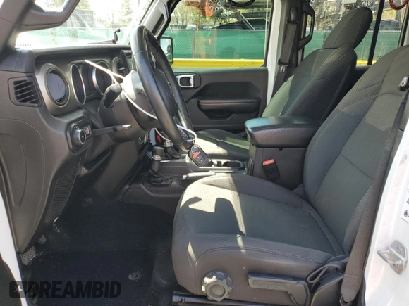 2018 Jeep Wrangler Unlimited Sport S with VIN 1C4HJXDN9JW279137, listed as a Copart auction lot 55357535 with 72,104 mi miles and Salvage title. Bid and sale history available at DreamBid. Image 7.