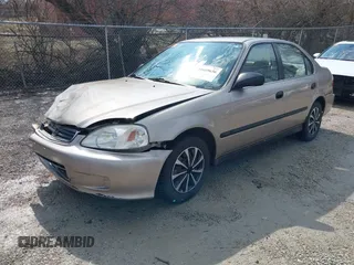2000 Honda Civic LX with VIN 1HGEJ6574YL029220, listed as a IAAI auction lot 41669636 with 248,232 mi miles and . Bid and sale history available at carsss.com. Image 21.