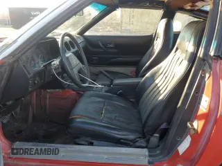 1983 Datsun 280ZX z VIN JN1HZ04S0DX569855, wystawiony jako Copart lot #74027594 z przebiegiem 12 300 mil mil oraz Szkody całkowita. Historia ofert i sprzedaży dostępna na DreamBid. Obrazek 7.