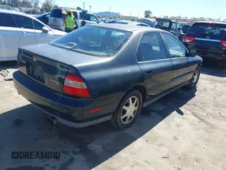 1994 Honda Accord EX with VIN JHMCD5652RC096984, listed as a IAAI auction lot 41734743 with 199,052 mi miles. Bid and sale history available at carsss.com. Image 4.