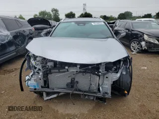2025 Lexus UX with VIN JTHUCJDH3S2001129, listed as a Copart auction lot 65140554 with 875 mi miles and Salvage Title. Bid and sale history available at carsss.com. Image 5.