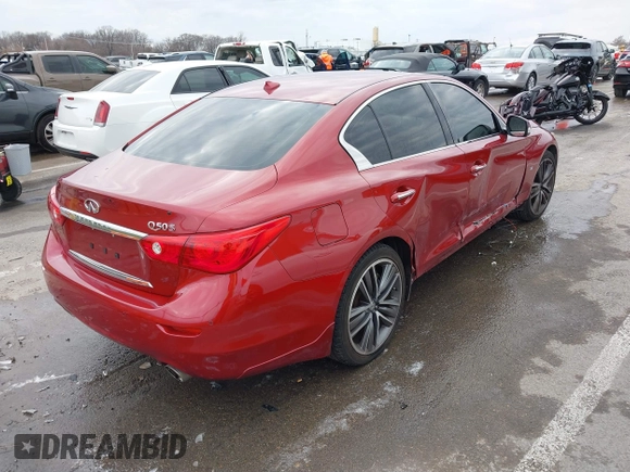 2014 Infiniti Q50 Premium with VIN JN1BV7AR5EM704052, listed as a IAAI auction lot 41155726 with 100,830 mi miles. Bid and sale history available at carsss.com. Image 4.