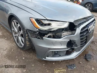 2013 Audi A6 3.0T Prestige with VIN WAUHGAFC3DN131239, listed as a IAAI auction lot 41168869 with 134,628 mi miles. Bid and sale history available at carsss.com. Image 6.