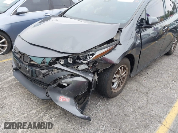 2018 Toyota Prius Plus with VIN JTDKARFP5J3095377, listed as a IAAI auction lot 42153552 with 77,255 mi miles and . Bid and sale history available at DreamBid. Image 19.