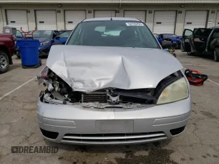 2007 Ford Focus S z VIN 1FAFP31N67W299458, wystawiony jako Copart lot #52703425 z przebiegiem 231 936 mil mil oraz Szkody całkowita. Historia ofert i sprzedaży dostępna na DreamBid. Obrazek 5.