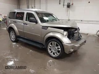 2007 Dodge Nitro SLT with VIN 1D8GU58K57W673543, listed as a IAAI auction lot 41574634 with 64,286 mi miles. Bid and sale history available at carsss.com. Image 1.