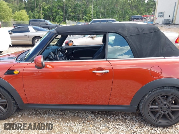 2011 MINI Convertible with VIN WMWZN3C57BTZ89303, listed as a IAAI auction lot 42352242 with 146,448 mi miles and . Bid and sale history available at DreamBid. Image 14.