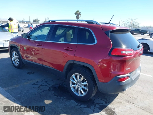 2015 Jeep Cherokee Limited with VIN 1C4PJMDB1FW599205, listed as a IAAI auction lot 41709308 with 112,415 mi miles. Bid and sale history available at carsss.com. Image 3.