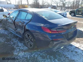 2020 BMW 8 Series 840i with VIN WBAGV4C01LCD97854, listed as a IAAI auction lot 41263040 with 66,935 mi miles. Bid and sale history available at carsss.com. Image 3.