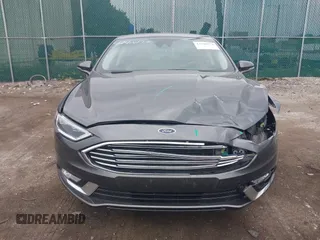 2017 Ford Fusion Titanium with VIN 3FA6P0K96HR208757, listed as a IAAI auction lot 42400172 with 90,000 mi miles and . Bid and sale history available at DreamBid. Image 12.