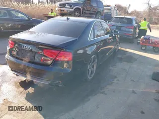 2014 Audi S8 with VIN WAUD2AFD8EN003571, listed as a IAAI auction lot 41590474 with 102,342 mi miles. Bid and sale history available at carsss.com. Image 4.