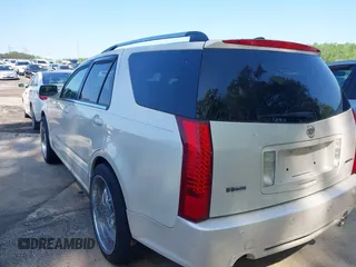 2008 Cadillac SRX with VIN 1GYEE63A480108836, listed as a IAAI auction lot 41993953 with 135,254 mi miles. Bid and sale history available at carsss.com. Image 3.