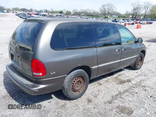 1999 Chrysler Town & Country LXi with VIN 1C4GP54LXXB553393, listed as a IAAI auction lot 41968605 with 256,400 mi miles. Bid and sale history available at carsss.com. Image 4.