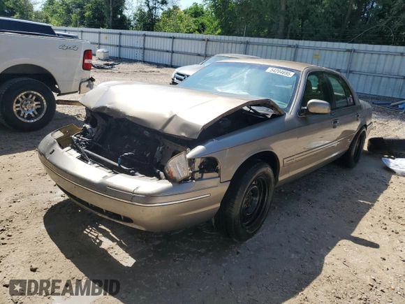 2003 Ford Crown Victoria LX z VIN 2FAFP74W33X141881, wystawiony jako Copart lot #54204695 z przebiegiem 98 466 mil mil oraz Szkoda całkowita • Salvage title. Historia ofert i sprzedaży dostępna na DreamBid. Obrazek 1.
