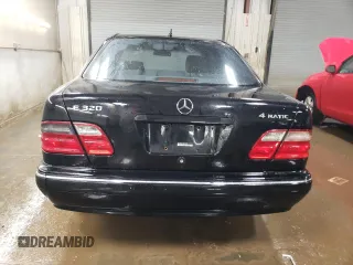 2001 Mercedes-Benz E-Class AWD with VIN WDBJF82J11X056639, listed as a Copart auction lot 49428325 with 145,218 mi miles and Salvage Title. Bid and sale history available at carsss.com. Image 6.