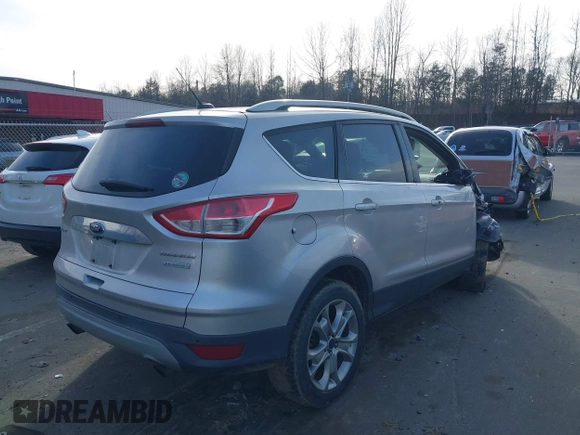 2014 Ford Escape Titanium with VIN 1FMCU0JX3EUB22005, listed as a IAAI auction lot 41610799 with 248,066 mi miles. Bid and sale history available at carsss.com. Image 4.