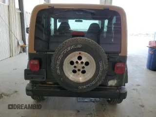 1998 Jeep Wrangler Sahara z VIN 1J4FY49S4WP728476, wystawiony jako Copart lot #53490515 z przebiegiem 272 058 mil mil oraz Czysty tytuł • Clean title. Historia ofert i sprzedaży dostępna na DreamBid. Obrazek 6.