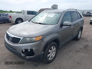 2011 Kia Sorento LX with VIN 5XYKTDA14BG141553, listed as a IAAI auction lot 42190896 with 212,690 mi miles and . Bid and sale history available at carsss.com. Image 2.