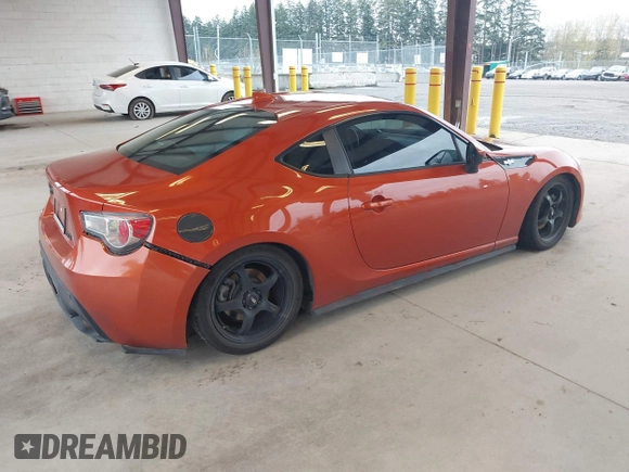 2015 Scion FR-S with VIN JF1ZNAA17F8703357, listed as a IAAI auction lot 41924644 with 62,023 mi miles. Bid and sale history available at carsss.com. Image 4.