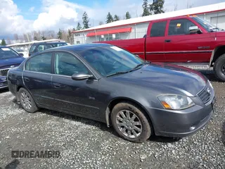 2006 Nissan Altima 2.5 with VIN 1N4AL11D06N304367, listed as a IAAI auction lot 41808294 with 198,815 mi miles. Bid and sale history available at carsss.com. Image 14.