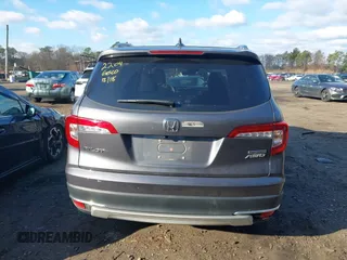 2022 Honda Pilot Touring 7-Passenger with VIN 5FNYF6H62NB010647, listed as a IAAI auction lot 41199560 with 102,066 mi miles. Bid and sale history available at carsss.com. Image 16.