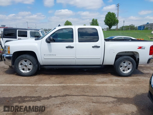 2013 Chevrolet Silverado 1500 LT with VIN 3GCPKSE70DG185517, listed as a IAAI auction lot 42062395 with 173,083 mi miles and . Bid and sale history available at DreamBid. Image 14.