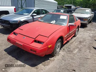 1986 Nissan 300ZX z VIN JN1HZ14S4GX164916, wystawiony jako IAAI lot #42295717 z przebiegiem 254 114 mil mil oraz . Historia ofert i sprzedaży dostępna na DreamBid. Obrazek 2.