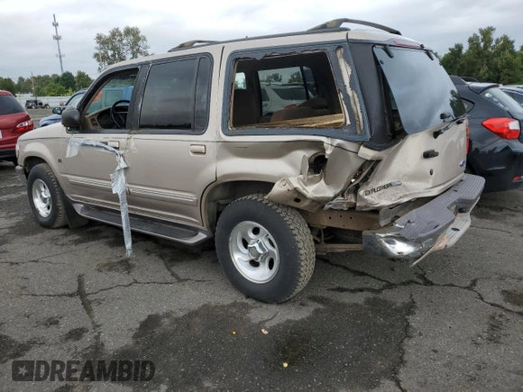 1997 Ford Explorer XLT with VIN 1FMDU35PXVZB69793, listed as a Copart auction lot 70712774 with 138,243 mi miles and Salvage title. Bid and sale history available at DreamBid. Image 2.