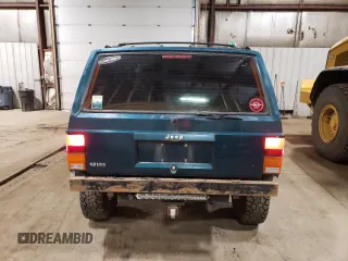 1996 Jeep Cherokee Sport with VIN 1J4FJ68S1TL226495, listed as a Copart auction lot 58587685 with 205,397 mi miles and Salvage title. Bid and sale history available at DreamBid. Image 6.