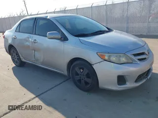 2011 Toyota Corolla L with VIN JTDBU4EE0BJ102517, listed as a IAAI auction lot 41702532 with 296,646 mi miles. Bid and sale history available at carsss.com. Image 1.