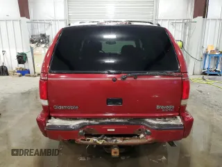 1999 Oldsmobile Bravada z VIN 1GHDT13W4X2705200, wystawiony jako Copart lot #43416245 z przebiegiem 173 522 mil mil oraz Szkoda całkowita • Salvage title. Historia ofert i sprzedaży dostępna na DreamBid. Obrazek 6.