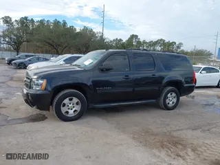 2010 Chevrolet Suburban Commercial with VIN 1GNUKHE38AR190423, listed as a IAAI auction lot 41361377 with 215,187 mi miles. Bid and sale history available at carsss.com. Image 14.