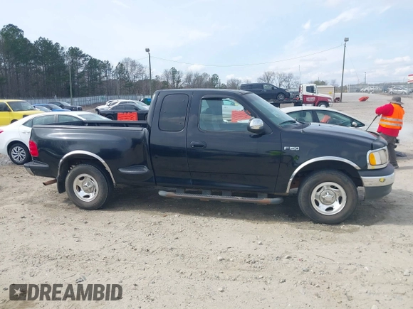 2000 Ford F-150 XL with VIN 1FTZX0725YKA09559, listed as a IAAI auction lot 41810954 with Not provided miles and . Bid and sale history available at DreamBid. Image 13.