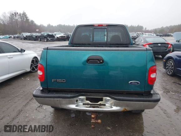 1998 Ford F-150 with VIN 1FTZF08W9WKC01424, listed as a IAAI auction lot 41926191 with 191,424 mi miles and . Bid and sale history available at DreamBid. Image 16.