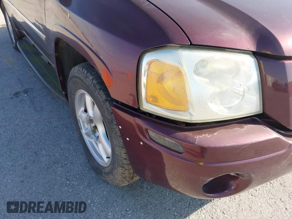 2006 GMC Envoy SLE z VIN 1GKDT13S762328884, wystawiony jako IAAI lot #41778198 z przebiegiem Nie podano mil oraz . Historia ofert i sprzedaży dostępna na DreamBid. Obrazek 6.