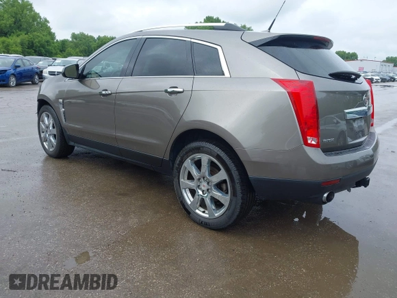 2012 Cadillac SRX Premium Collection z VIN 3GYFNCE3XCS620507, wystawiony jako IAAI lot #42348835 z przebiegiem 184 737 mil mil oraz . Historia ofert i sprzedaży dostępna na DreamBid. Obrazek 3.
