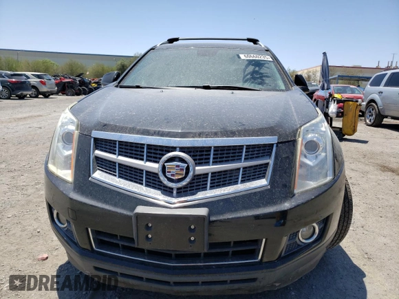 2011 Cadillac SRX Premium Collection with VIN 3GYFNFEY6BS610097, listed as a Copart auction lot 60660235 with 138,616 mi miles and Salvage title. Bid and sale history available at DreamBid. Image 5.
