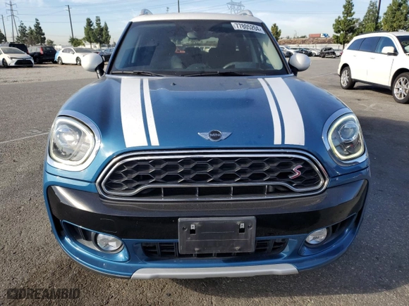 2017 MINI Countryman Cooper S with VIN WMZYT3C37H3B66319, listed as a Copart auction lot 77805204 with 65,452 mi miles and Salvage Title. Bid and sale history available at carsss.com. Image 5.