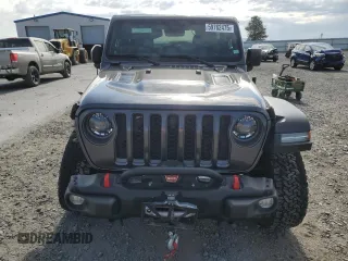 2023 Jeep Wrangler Rubicon with VIN 1C4HJXCG5PW652704, listed as a Copart auction lot 59762475 with 19,924 mi miles and Salvage title. Bid and sale history available at DreamBid. Image 5.